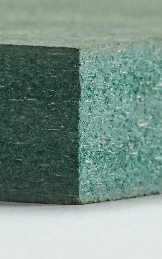 Edge of a green HDHMR board.